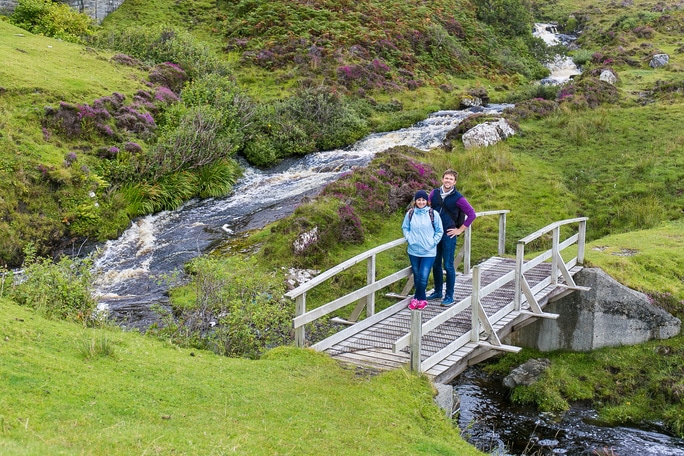 Couple in Moorland of Highlands, Scotland, UK