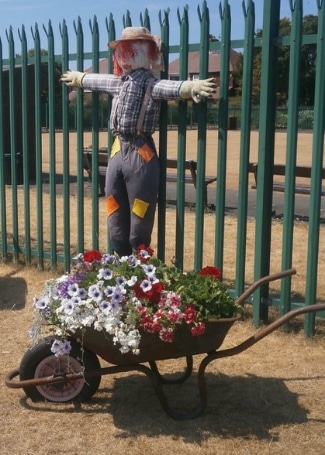 Highfield Park's scarecrow in their Calliope Colour My Life entry in the 2018 Cultivation Street competition