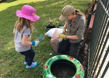 Welsh House Farm Green Grafters planting in recyled tyres for their Cultivation Street garden