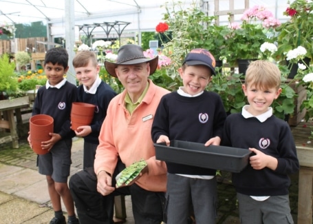 Cultivation Street Ambassador Graham Bicker from Graham Bicker Little Heath Garden Store with children from a local primary school