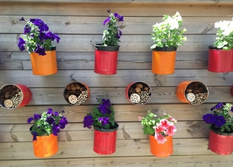 Hammersmith Academy Calliope recycled planters and bug hotels in their Cultivation Street garden