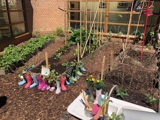 Wellie planters in one of the gardens Notcutts Jackie Barker has worked with during the 2018 competition