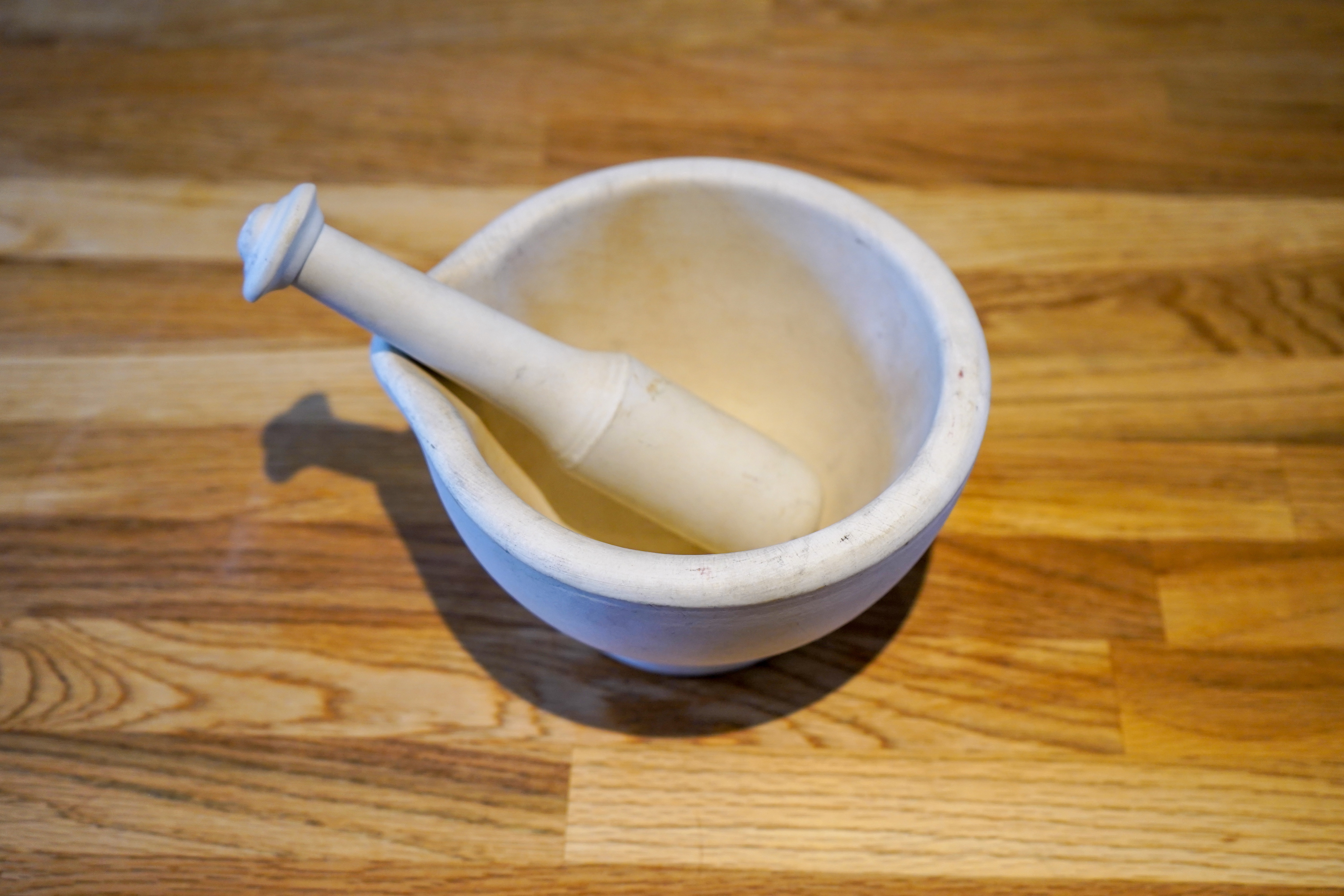 White pestle and mortar in a kitchen