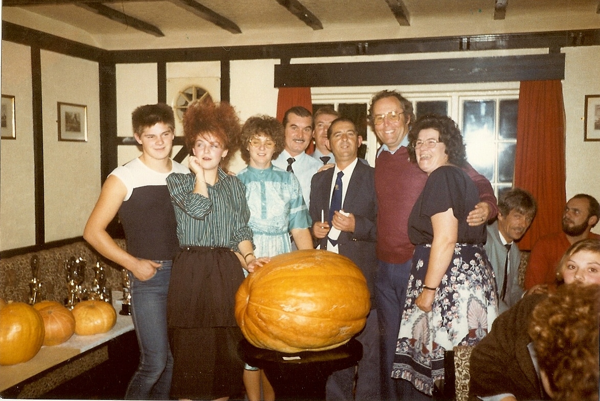 1980s start of pumpkin championships dad in purple jumper