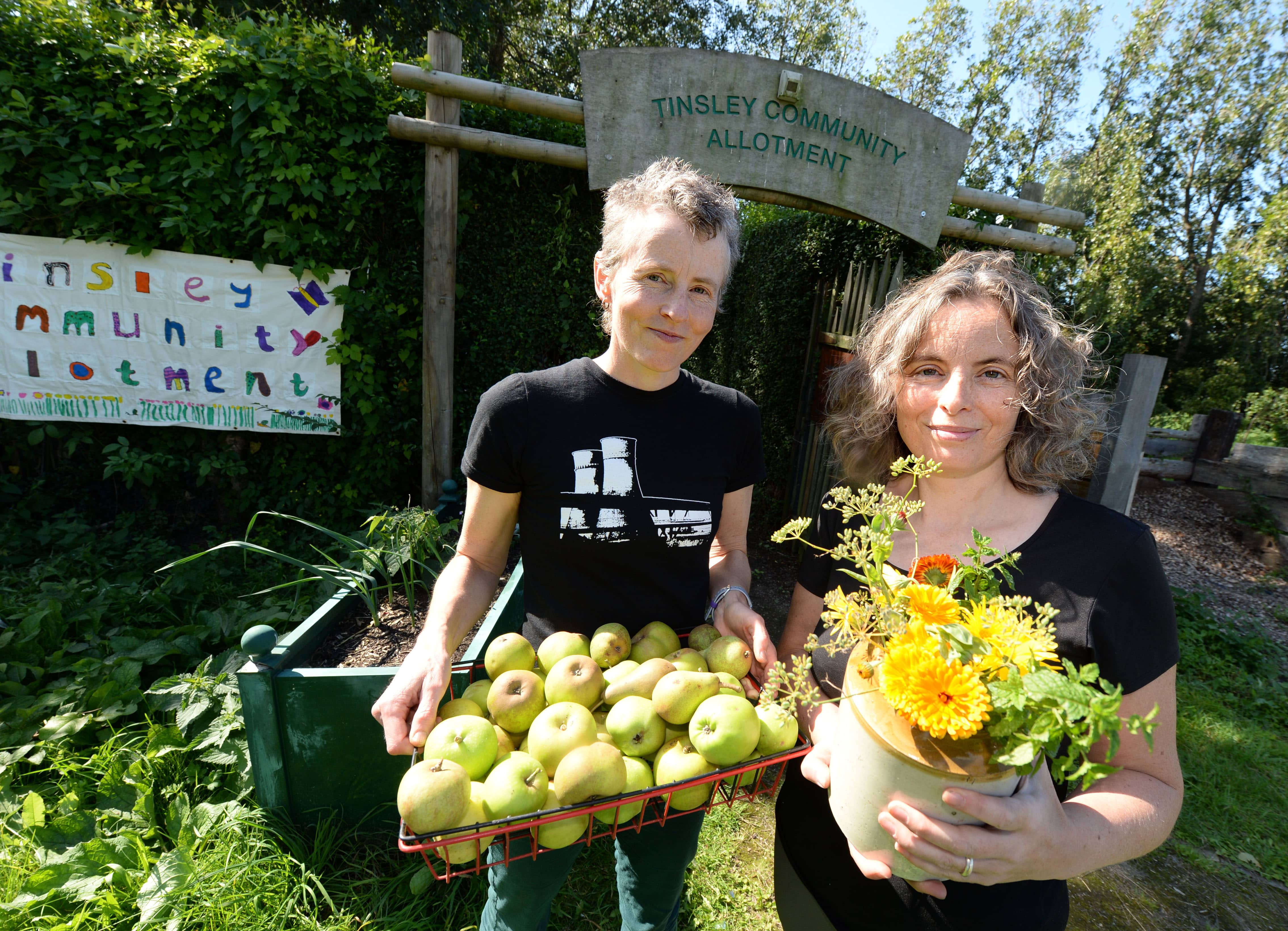 Allotment workers Jess Banham (L) and Jacqui Dace (R), at the Tinsley Community Allotment in Sheffield, South Yorkshire, which has won a 'Cultivation Street' award - a competition run by celebrity gardener, David Domoney.