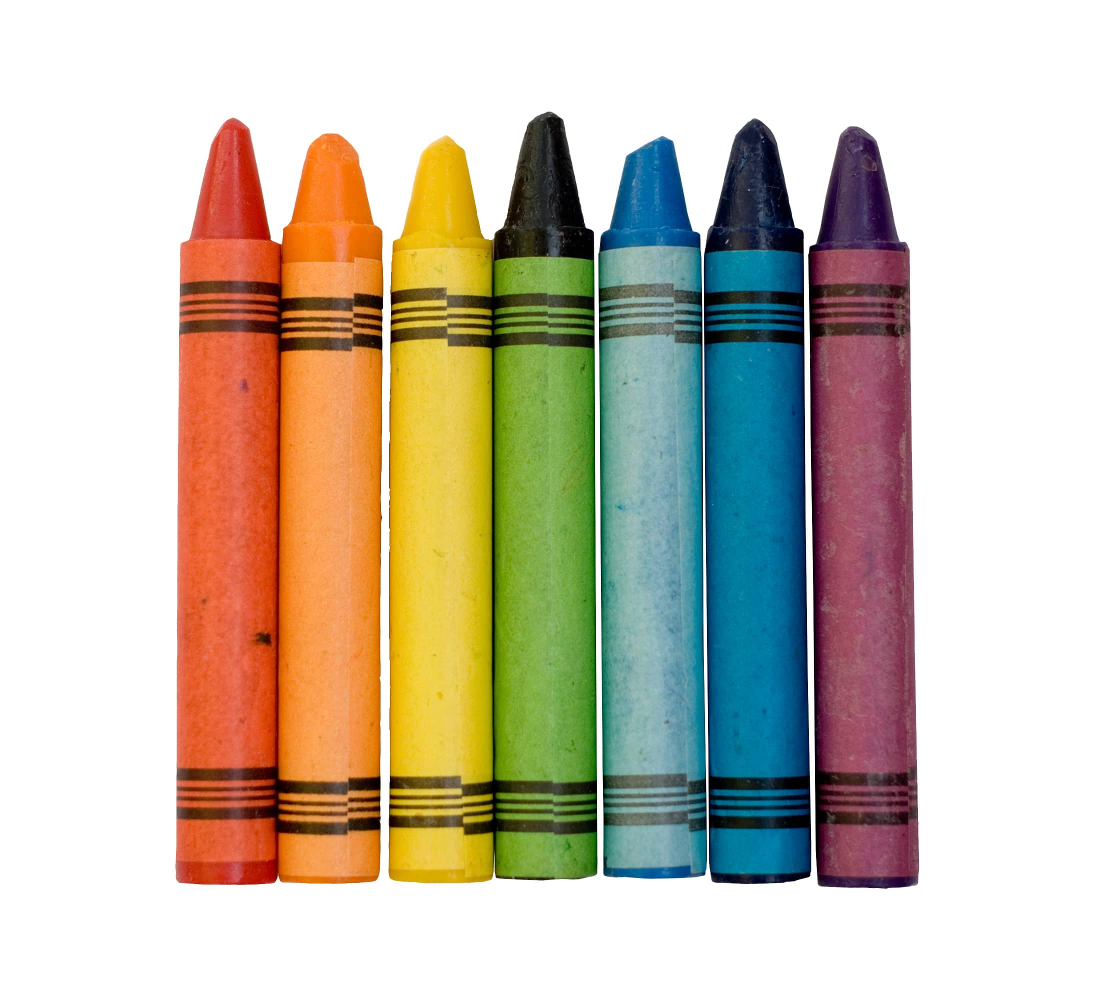 Seven used colored vax crayons form rainbow