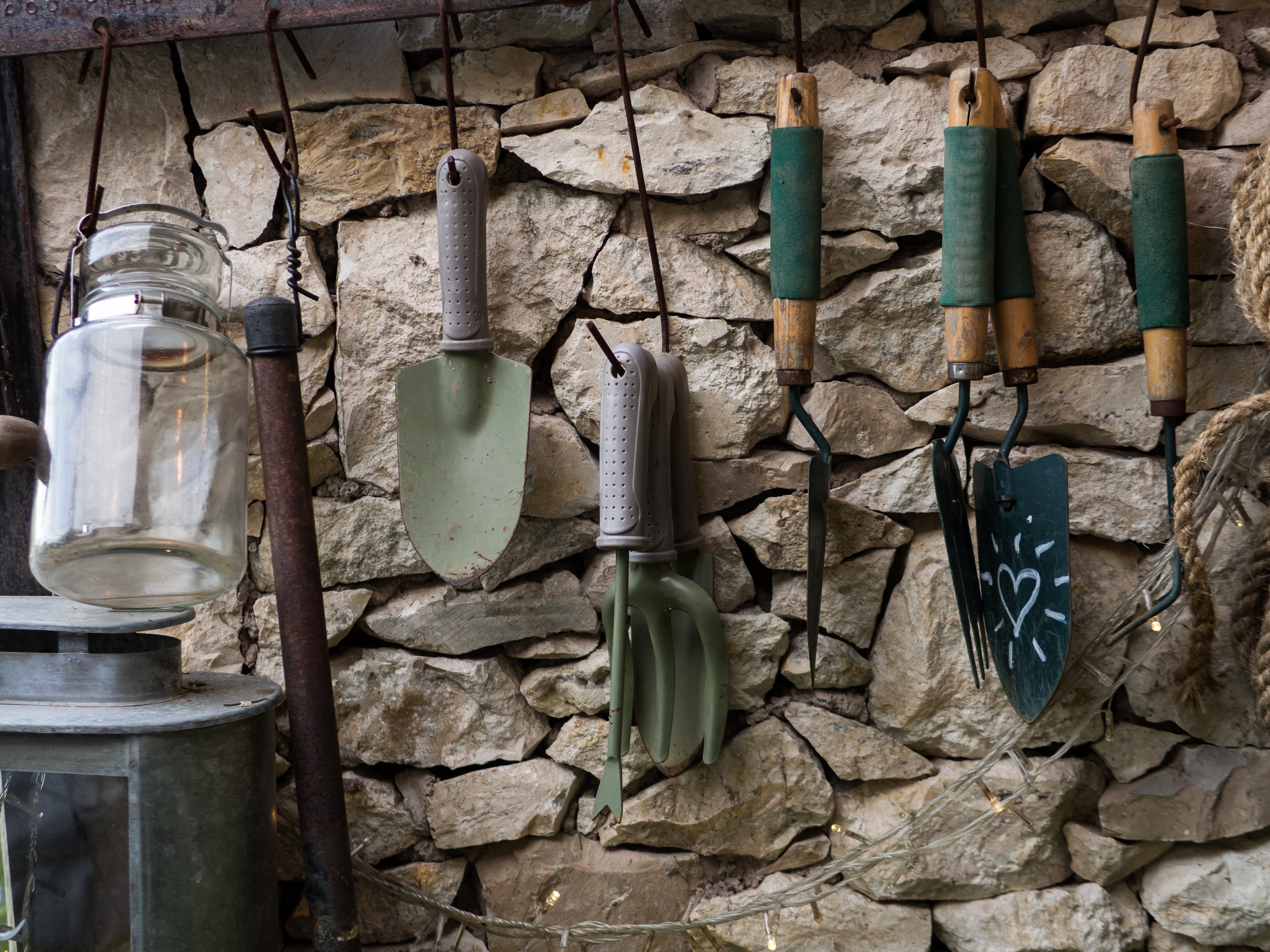 garden equipment hanging on the wall