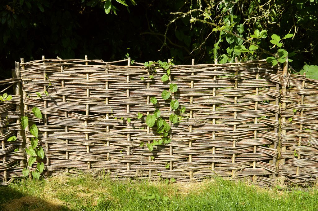 Wattle fences are lightweight construction material made by weaving thin branches
